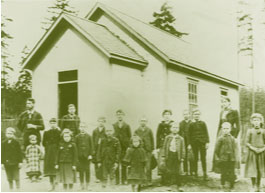 Students, including four Denny Children, at the original Oak Lake School, 1893