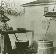 Making soap at the John and Mary Denny house, 1906